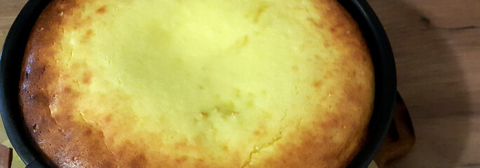 Homemade baking. Tasty casserole in a metal form.