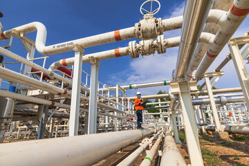 Male worker inspection at valve of visual check record pipeline oil and gas