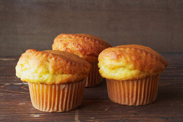 Traditional lemon muffins in natural window light