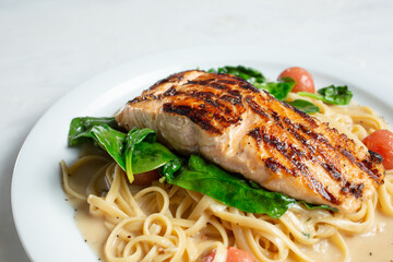 A view of a salmon pasta dish.