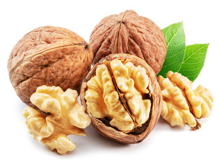Whole walnut and walnut kernels with leaves isolated on white background.