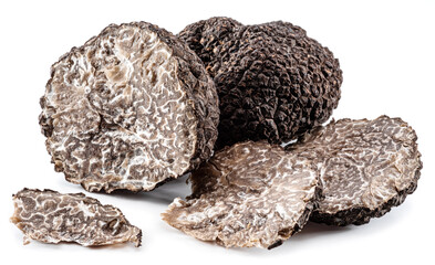 Black edible winter truffle on white background. The most famous of the truffles.