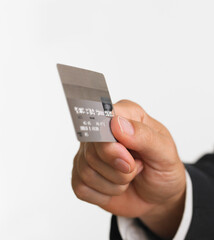 Business man's hand holding a credit card