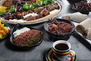 A view of assorted Ethiopian entrees, featuring a combination platter.