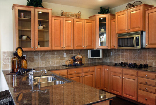 Remodeled kitchen with cherry cabinets