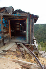 An old abandoned mining building in the mountains 