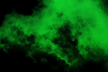Explosion chemistry green smoke bomb on isolated background. Freezing dry fog bombs texture...