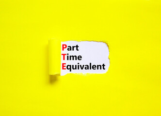 PTE Part time equivalent symbol. Concept words PTE Part time equivalent on white paper. Beautiful yellow table yellow background. Business and PTE Part time equivalent concept. Copy space.