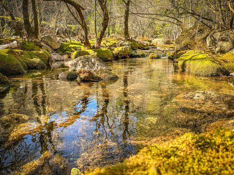 Water stream near Fecha de Barjas waterfall (also known as Tahiti waterfall) in the mountains of Peneda-Geres National Park, Portugal
