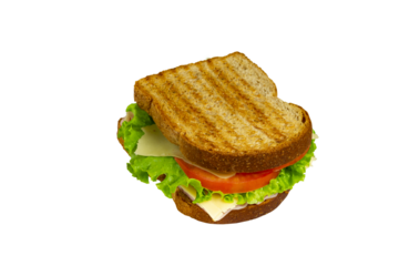 Sandwich with Ham, cheese, lettuce, and tomatoes inside of a loaf bread