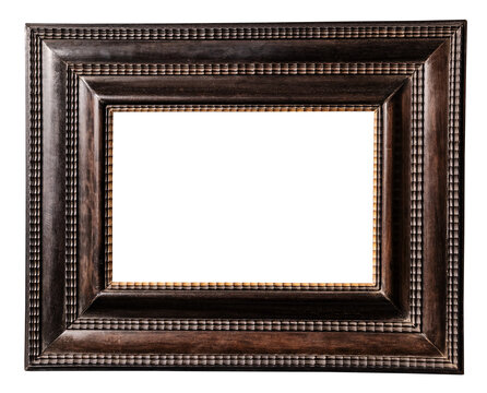 old very wide dark brown wooden picture frame isolated on white background with cut out canvas