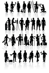 Isolated construction workers silhouettes with different tools