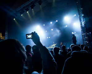 Fototapeta na wymiar people watching open air concert