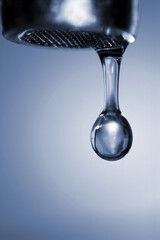 Dripping tap, close up