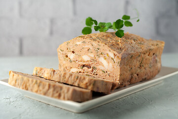 Chicken terrine. Chicken meat pate with fresh parsley