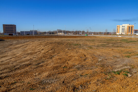 Polygon or housing development in a city with lots or empty lots to build