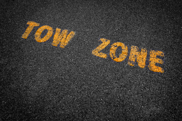 Two Zone Sign Painted on Asphalt Parking Area