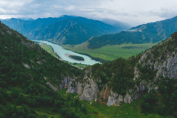 Naklejka na ściany i meble Summer landscape Altai mountains summer Russia, aerial top view. Blue Katun river with fog mood