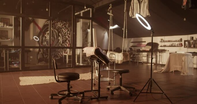 Interior of spacious furnished tattoo studio