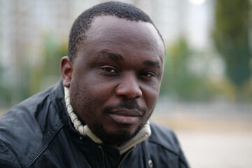 African american man from Nigeria looks at camera