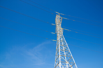 Power line and blue sky