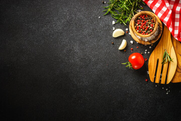 Fototapeta na wymiar Ingredients for cooking. Food background. Top view on black background.