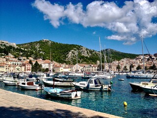 Fototapeta na wymiar Coast shore and boats in Hvar Island, Croatia
