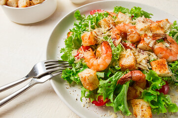 caesar salad, with shrimp, on a white background, homemade, no people,