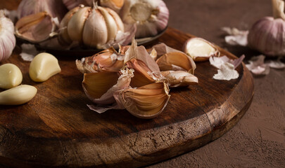 Fresh garlic, on a dark background, top view, food concept,