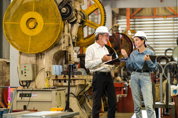 A new generation of engineers in a metal sheet factory. Studying work methods from supervisors or colleagues and studying by yourself be taught professionally