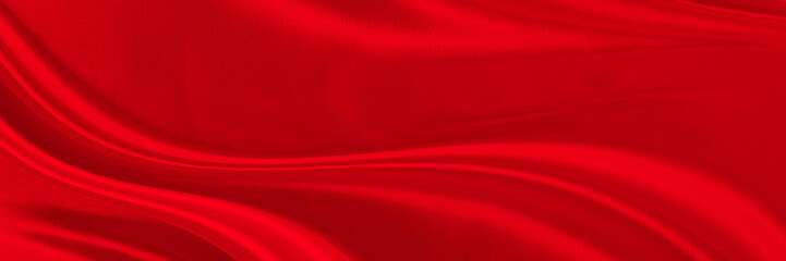 Black red satin dark fabric texture luxurious shiny that is abstract silk cloth background with patterns soft waves blur beautiful.