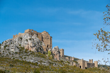 Fototapeta na wymiar Loarre Castle: The best preserved castle in Europe. Loarre Castle stands out from other destinations because its structure stands on the plains of the Hoya de Huesca region.