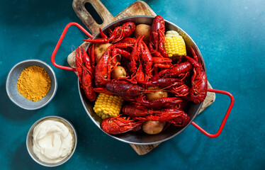 Crawfish boiled Louisiana,with corn on the cob, potatoes. Crawfish boiled in Cajun seasonings and...