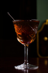 Cognac in fashion glass with cards