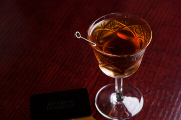 Cognac in fashion glass with cards