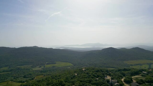 Breathtaking Panoramas: A Mesmerizing Leftward Journey over the Forests, Vineyards, and Majestic Terrains of Lecci, Corsica