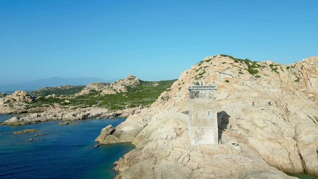 A Mesmerizing Aerial Journey: The Majestic Lighthouse of Capu di Fenu in Bonifacio, Corsica - A Study of Human Ingenuity Amidst the Rugged Natural Beauty of the Rocky Cliffs of the Coast