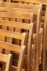 Folding wooden chairs. Close up.