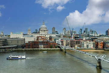 Millennium Bridge and St. Paul's Cathedral in London, UK.