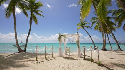 Beach wedding set up, tropical outdoor wedding reception. Wedding decoration chairs at the Beach