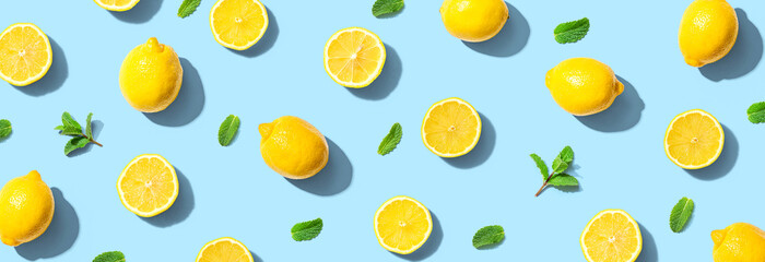 Fresh yellow lemons with mints overhead view - flat lay