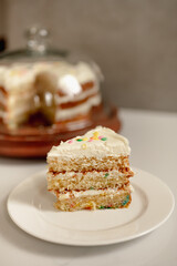 Funfetti Birthday Cake Slice with Colorful Fun Confetti Sprinkles and Frosting