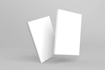 2 softcover book mockups are standing on a gray background, designed with 3D render visual effects that are indistinguishable from reality. A mockup, with flashy white covers resembling a real book.