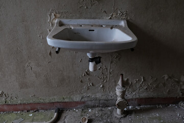 old dusty sink in abandoned house