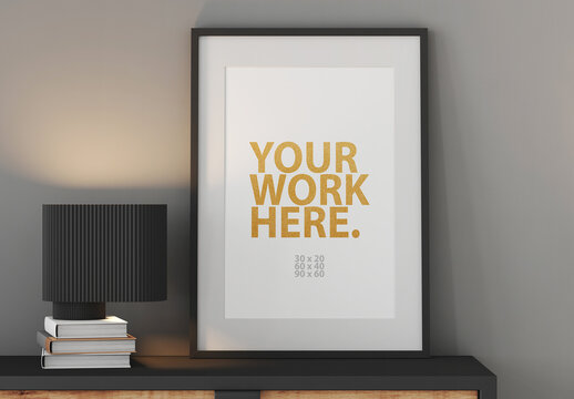 Poster Art Frame Mockup with passepartout on commode with black lamp