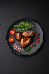 Delicious grilled meat in the form of a kebab with spices and herbs