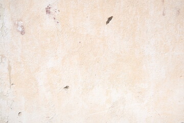 Concrete wall texture with cracks and scratches. Yellow and grey graphic materials	