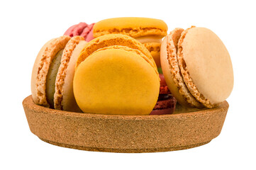 Colorful macaroons in a wooden bowl isolated on a transparent background