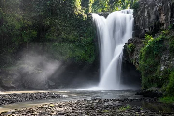  Tegenungan waterfall in jungle Ubud, Bali island Indonesia. Wallpaper background. Natural scenery. Touristic resort. © Vitalii_Mamchuk
