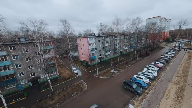 FPV shooting of roofs of old houses, aerial photography of old multi-storey houses, aerial photography of the roof of the house